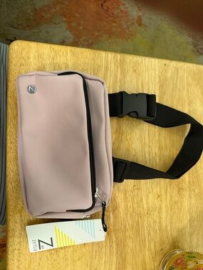 Double zip belt bag light lilac color